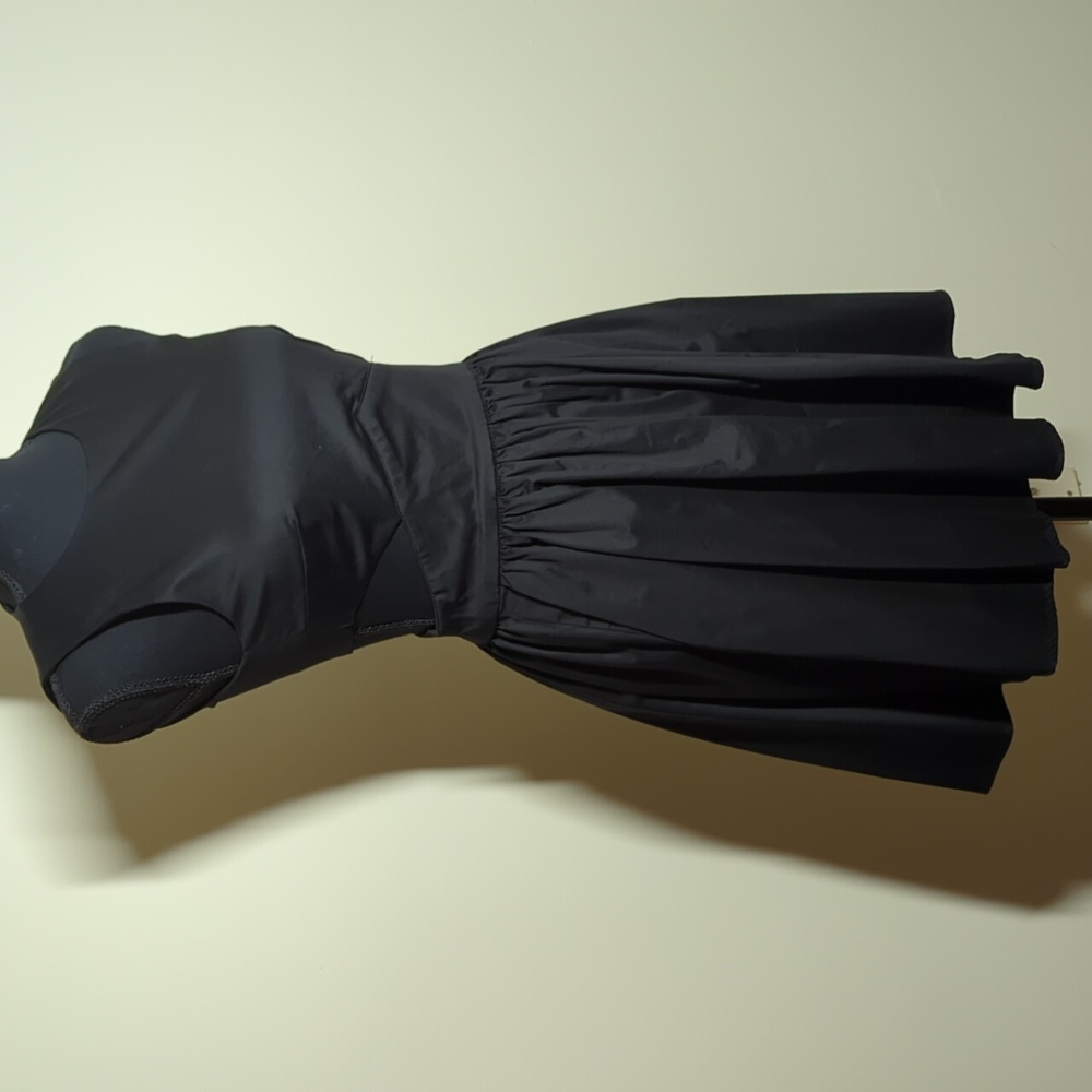 French Connection, size 4, LBD, with cutouts, exposed back zipper & Pockets.